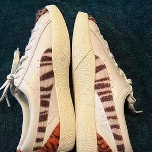 Leather Puma sneakers with zebra and cheetah print calf hair. Like new, worn 2x.